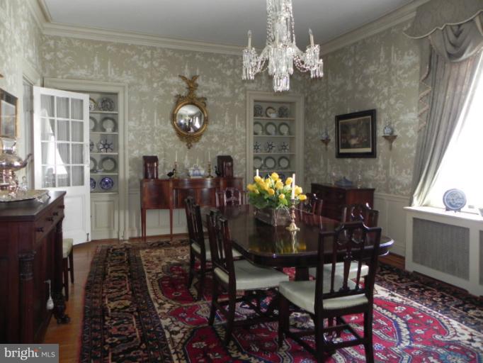 1705 South Road Baltimore, MD 21209 - Photo 15 of 29 a view of a dining room with furniture and chandelier