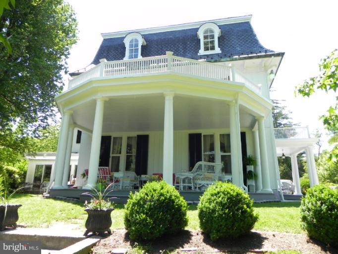 1705 South Road Baltimore, MD 21209 - Photo 24 of 29 a front view of a house with garden