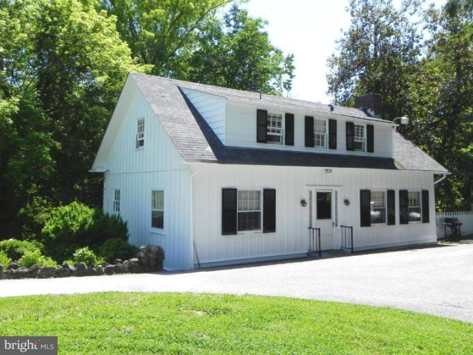 1705 South Road Baltimore, MD 21209 - Photo 27 of 29 a front view of a house with a yard