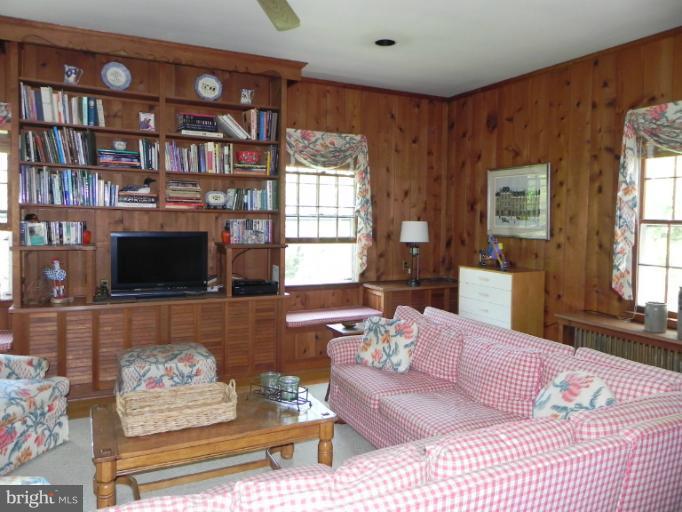 1705 South Road Baltimore, MD 21209 - Photo 7 of 29 a living room with furniture and a flat screen tv
