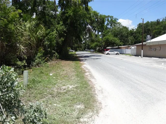 a view of street with view of trees