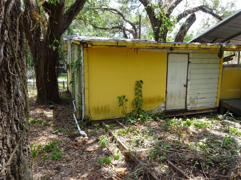8617 Broad Street New Port Richey, FL 34654 - Photo 3 of 14 a view of a back yard