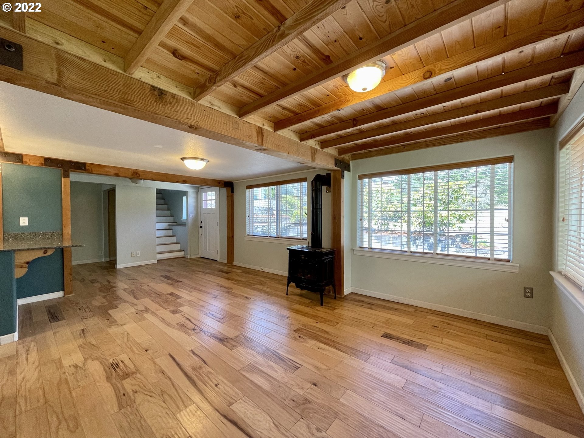 2275 Oak Street North Bend, OR 97459 - Photo 11 of 30 a view of empty room with wooden floor and fan