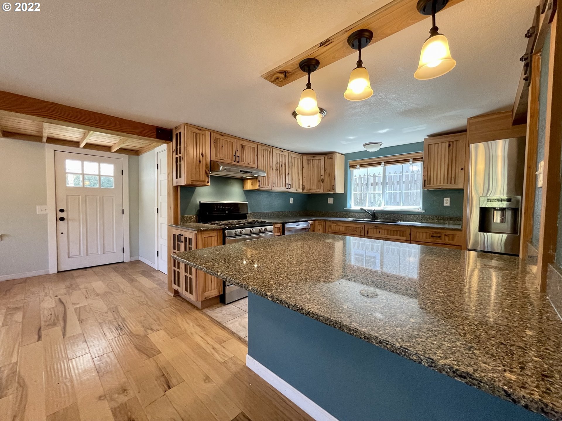 2275 Oak Street North Bend, OR 97459 - Photo 15 of 30 a large kitchen with stainless steel appliances granite countertop a lot of counter space