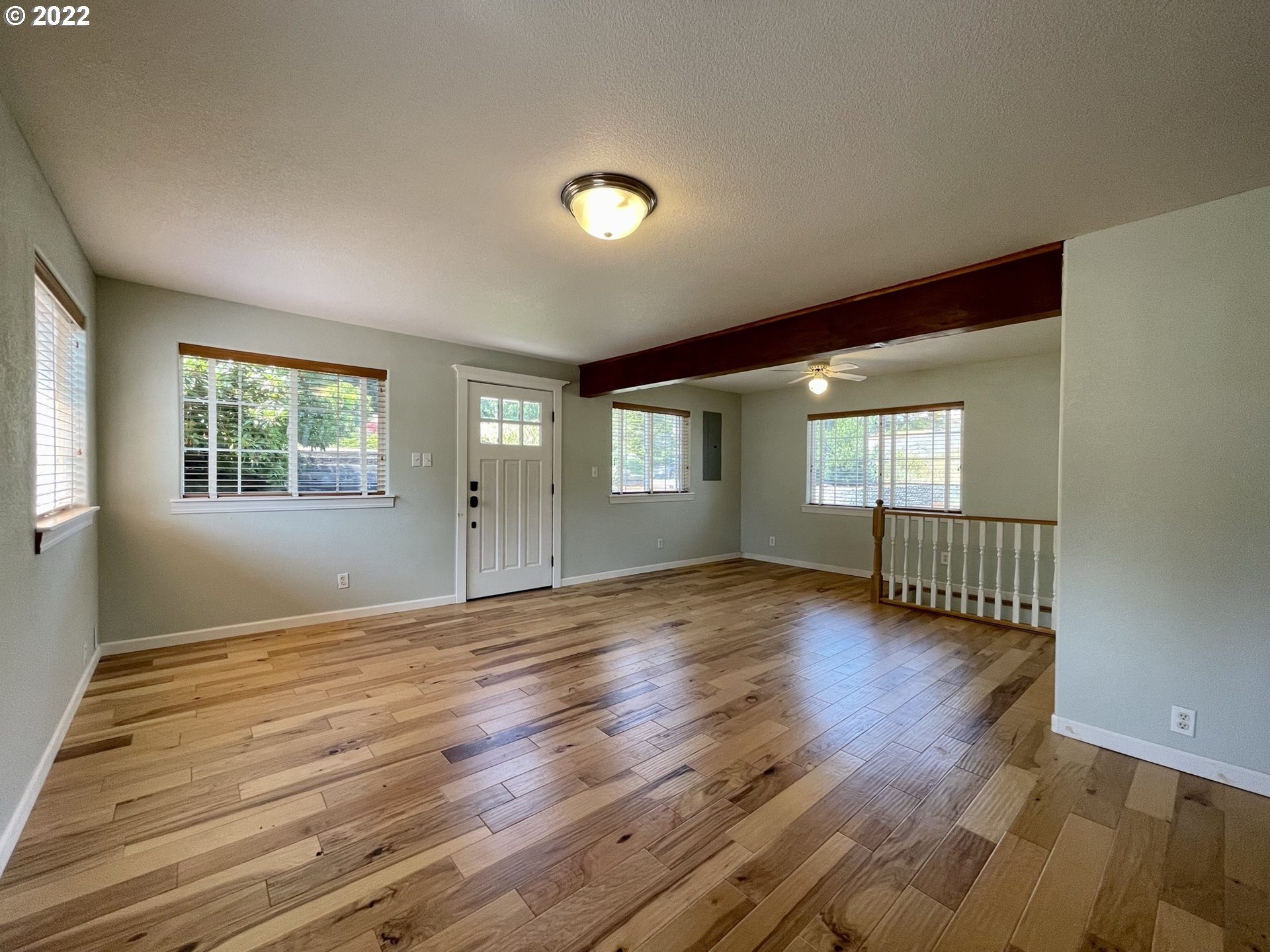 2275 Oak Street North Bend, OR 97459 - Photo 26 of 30 a view of an empty room with wooden floor and a window