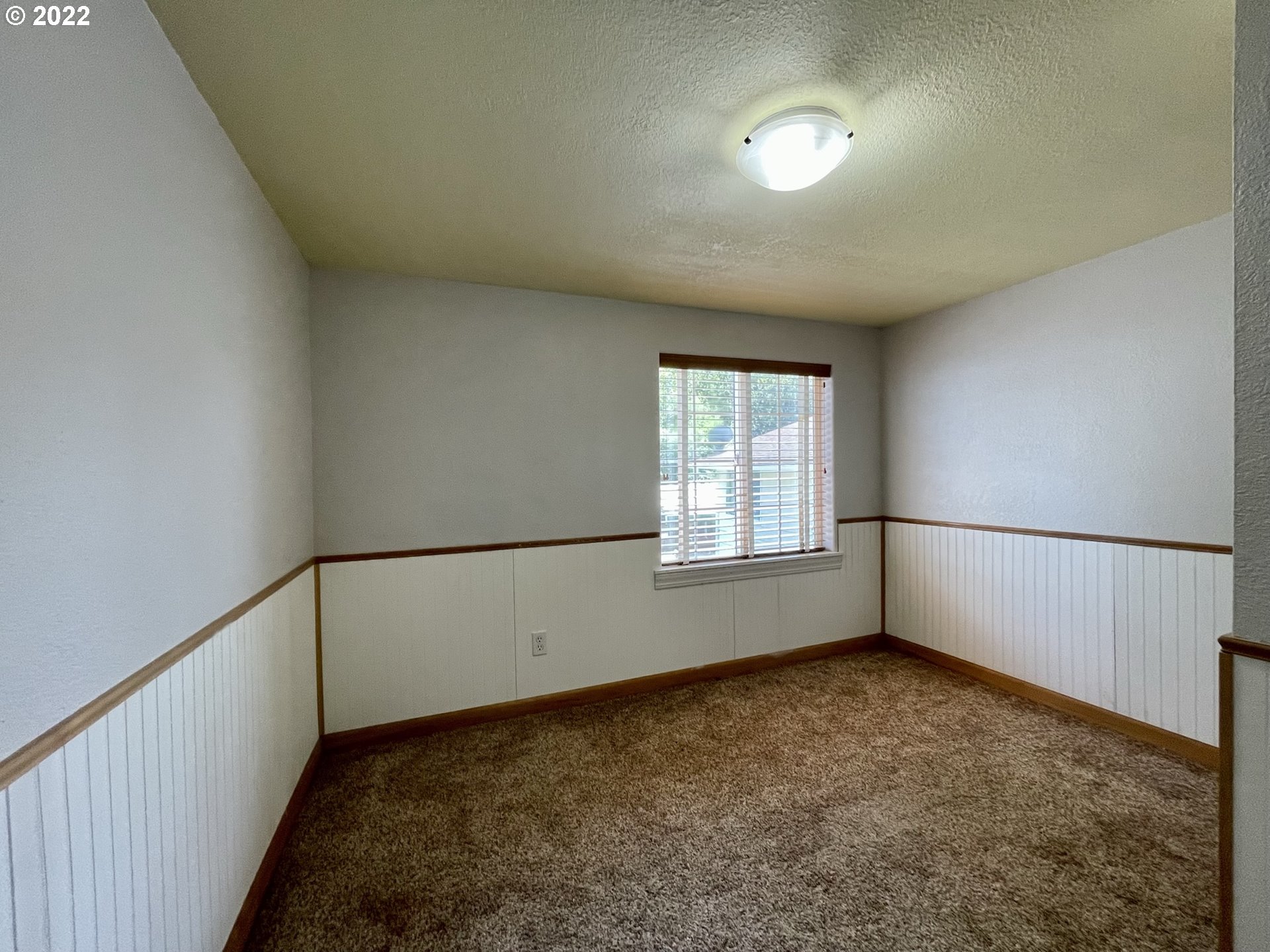 2275 Oak Street North Bend, OR 97459 - Photo 28 of 30 a view of an empty room with a window