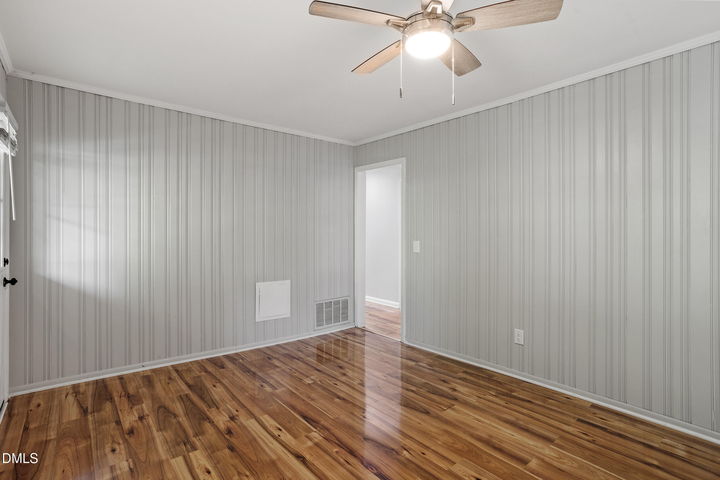 2414 Chapin Street Durham, NC 27707 - Photo 19 of 30 a view of an empty room with wooden floor
