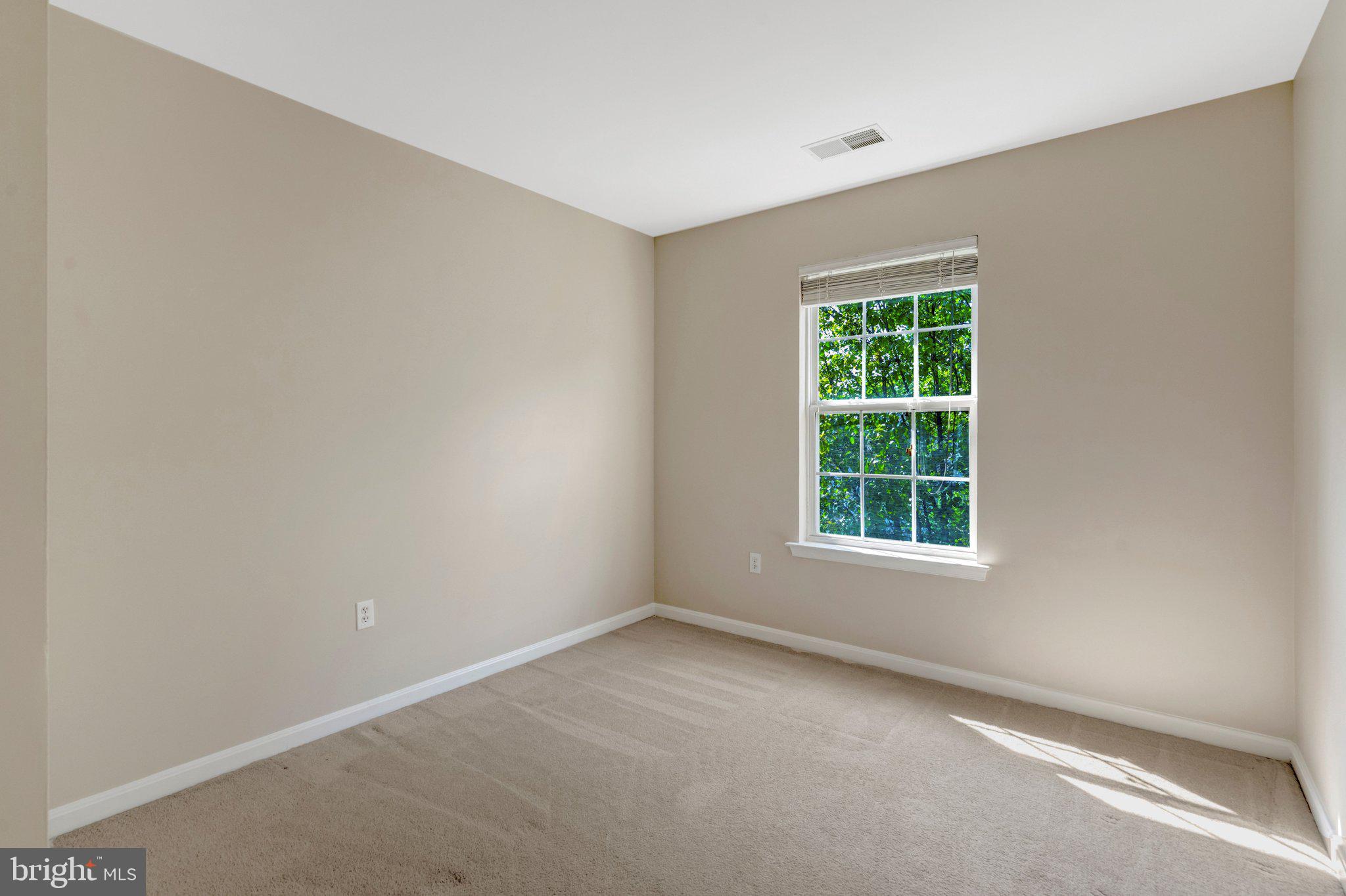 7706 Shadowcreek Terrace Springfield, VA 22153 - Photo 20 of 30 an empty room with a window