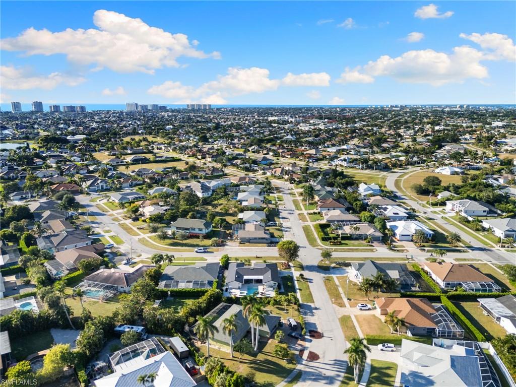 321 Columbus Way Marco Island, FL 34145 - Photo 37 of 40 Aerial view of property and surrounding area with nearby suburban area and nearby urban area