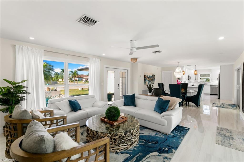 321 Columbus Way Marco Island, FL 34145 - Photo 6 of 40 Living room with recessed lighting, french doors, and ceiling fan