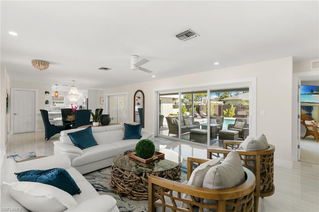 321 Columbus Way Marco Island, FL 34145 - Photo 7 of 40 Living room with ceiling fan and recessed lighting