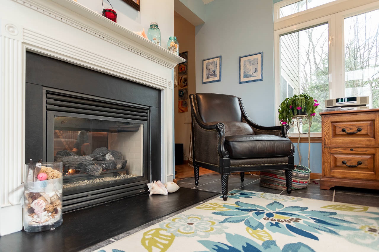180 Ridgemore Drive Raphine, VA 24472 - Photo 18 of 68 a workspace with furniture and a fireplace