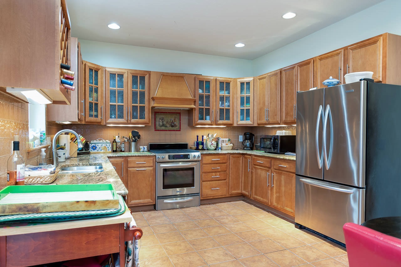 180 Ridgemore Drive Raphine, VA 24472 - Photo 2 of 68 a kitchen with stainless steel appliances granite countertop a refrigerator sink and stove