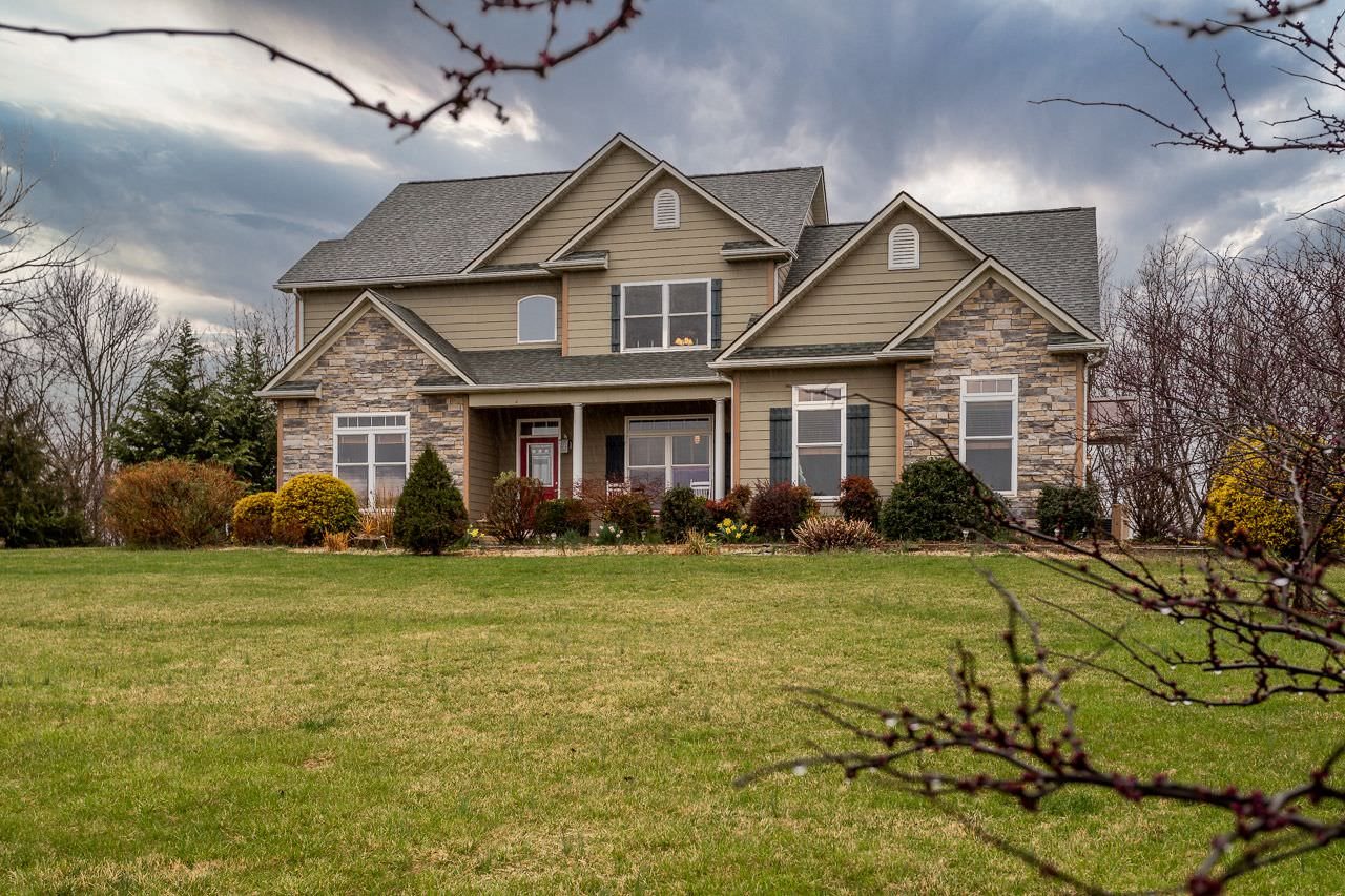 180 Ridgemore Drive Raphine, VA 24472 - Photo 43 of 68 a front view of a house with a yard