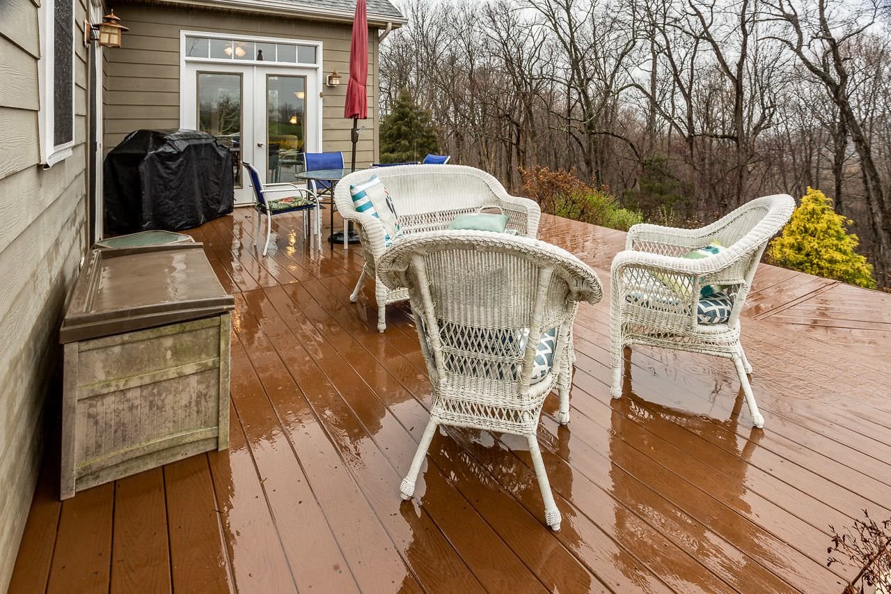 180 Ridgemore Drive Raphine, VA 24472 - Photo 48 of 68 a view of a patio with table and chairs with wooden floor
