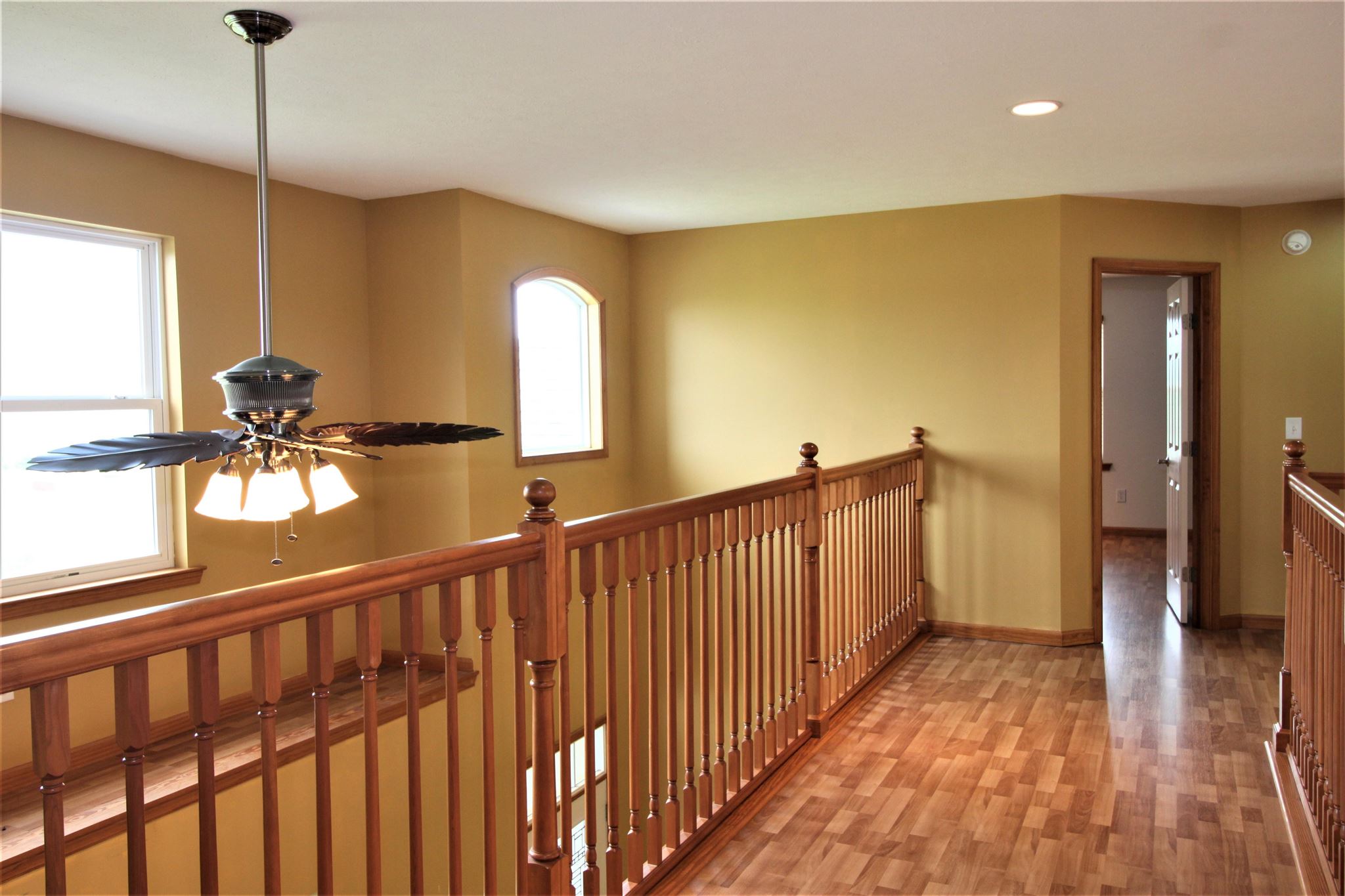 180 Ridgemore Drive Raphine, VA 24472 - Photo 63 of 68 a view of a hallway with wooden floor and staircase