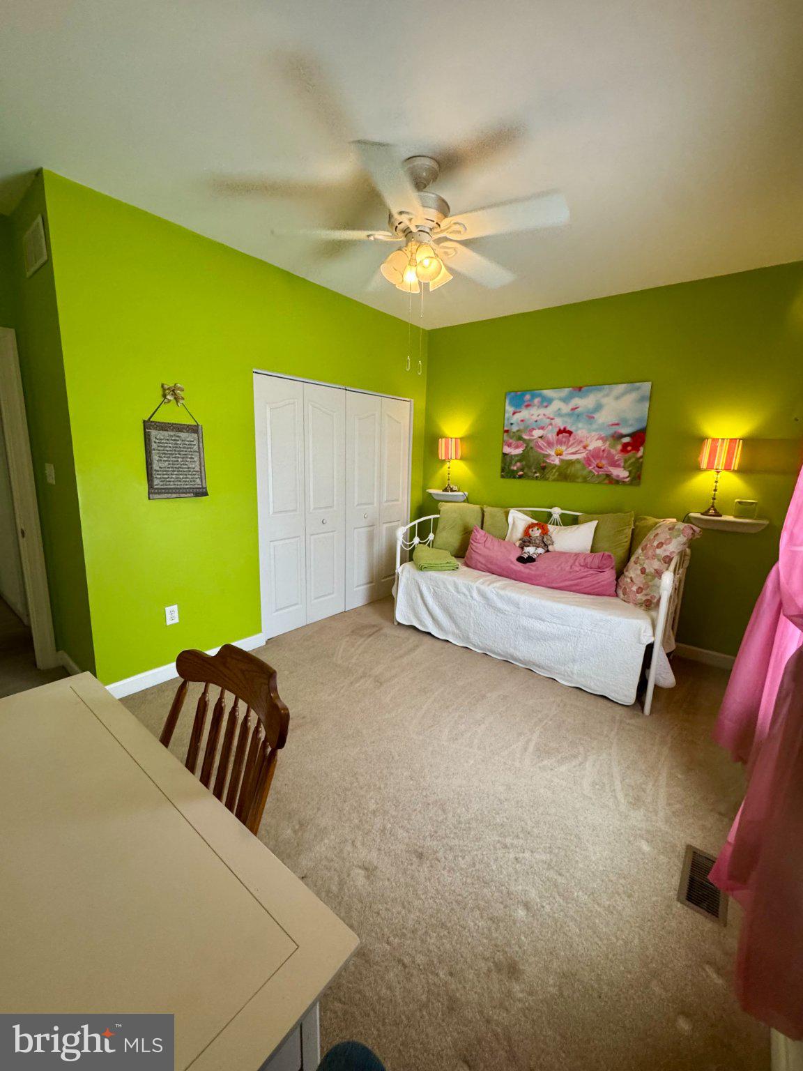 231 Foxglove Loop Bear, DE 19701 - Photo 22 of 30 a bedroom with a bed and ceiling fan