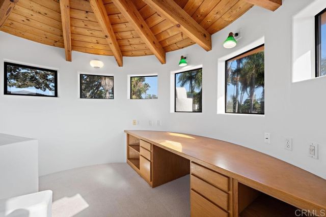 a view of a sink and a window