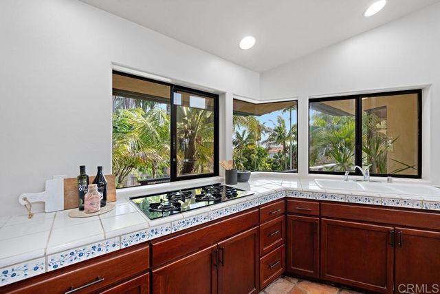 a living room with furniture fireplace and bookshelf