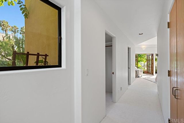 a bathroom with a sink a mirror and a shower