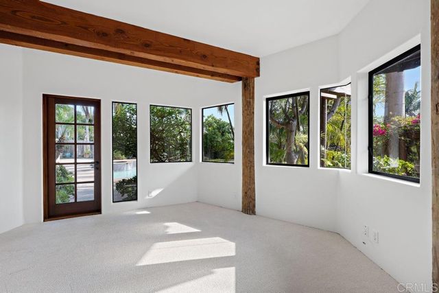 a view of a lake with a building in the background