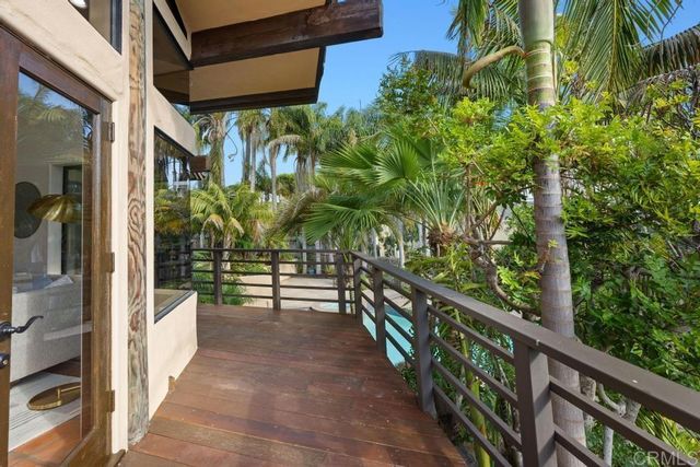 a view of a potted plants in front of a house