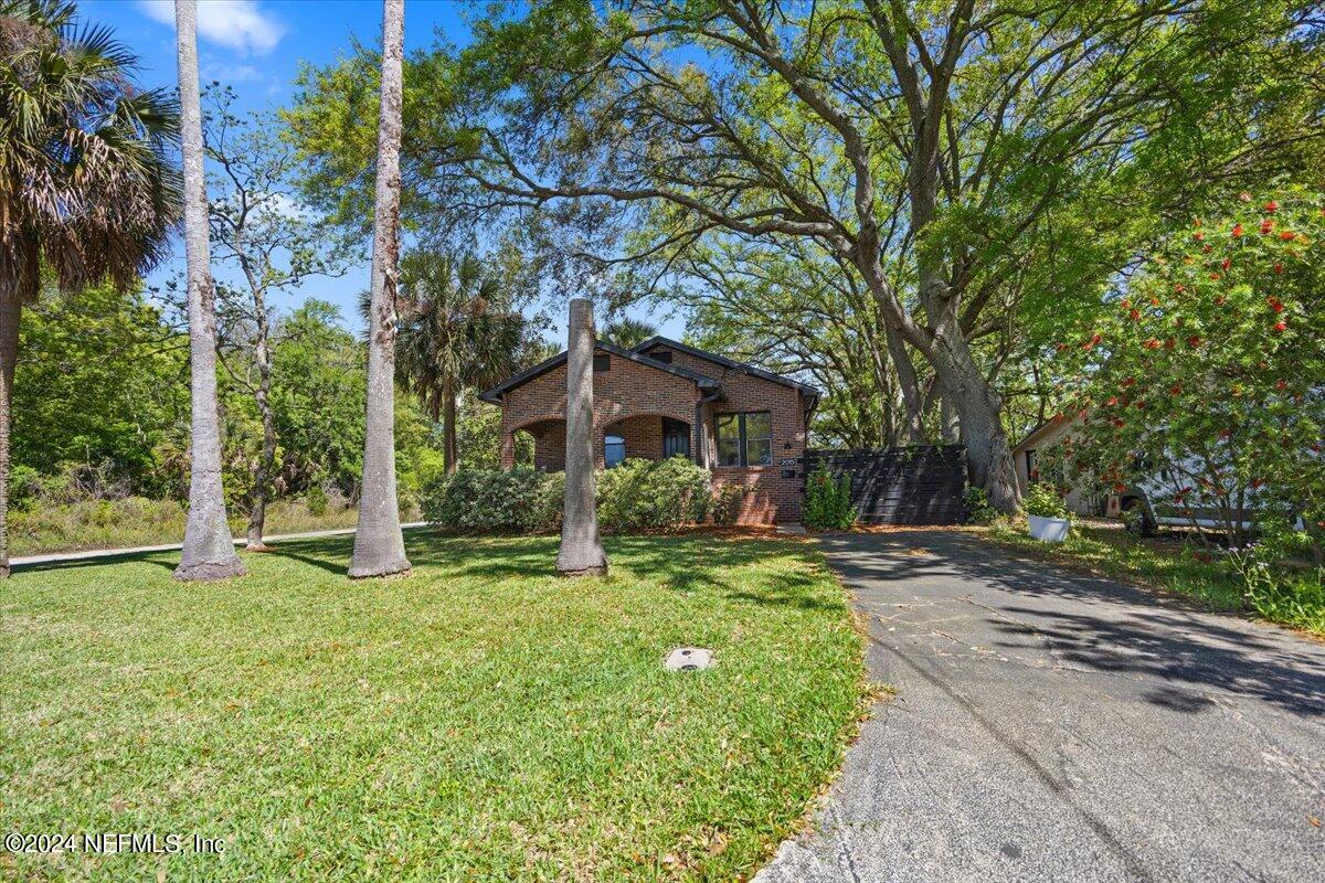 2015 Reed Avenue Jacksonville, FL 32207 - Photo 3 of 27 a view of a house with a yard and large tree