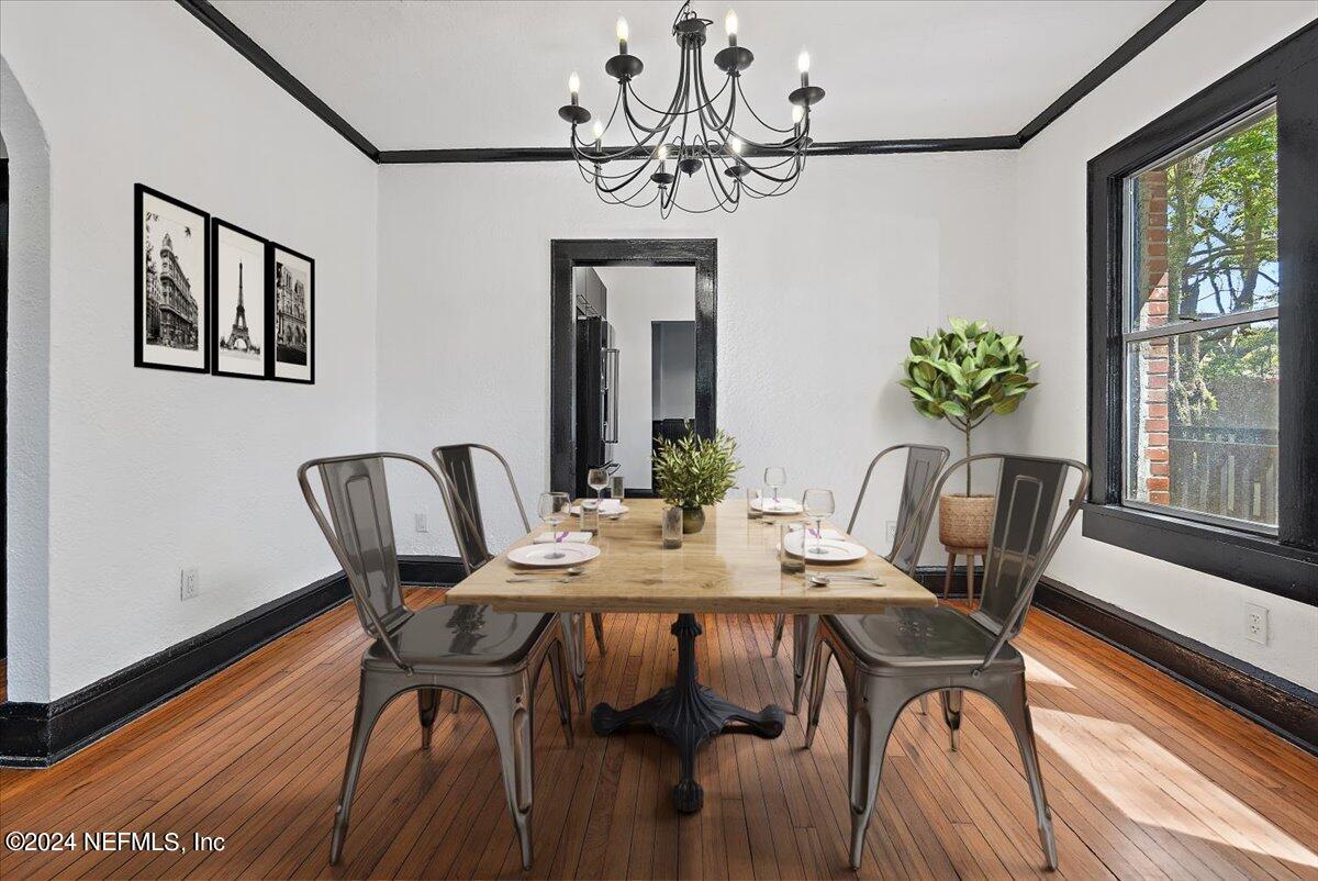 2015 Reed Avenue Jacksonville, FL 32207 - Photo 6 of 27 a view of a dining room with furniture window and wooden floor