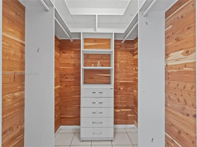 a bathroom with a shower and a toilet