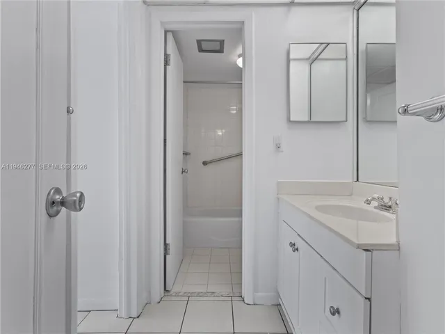 an aerial view of a house with swimming pool