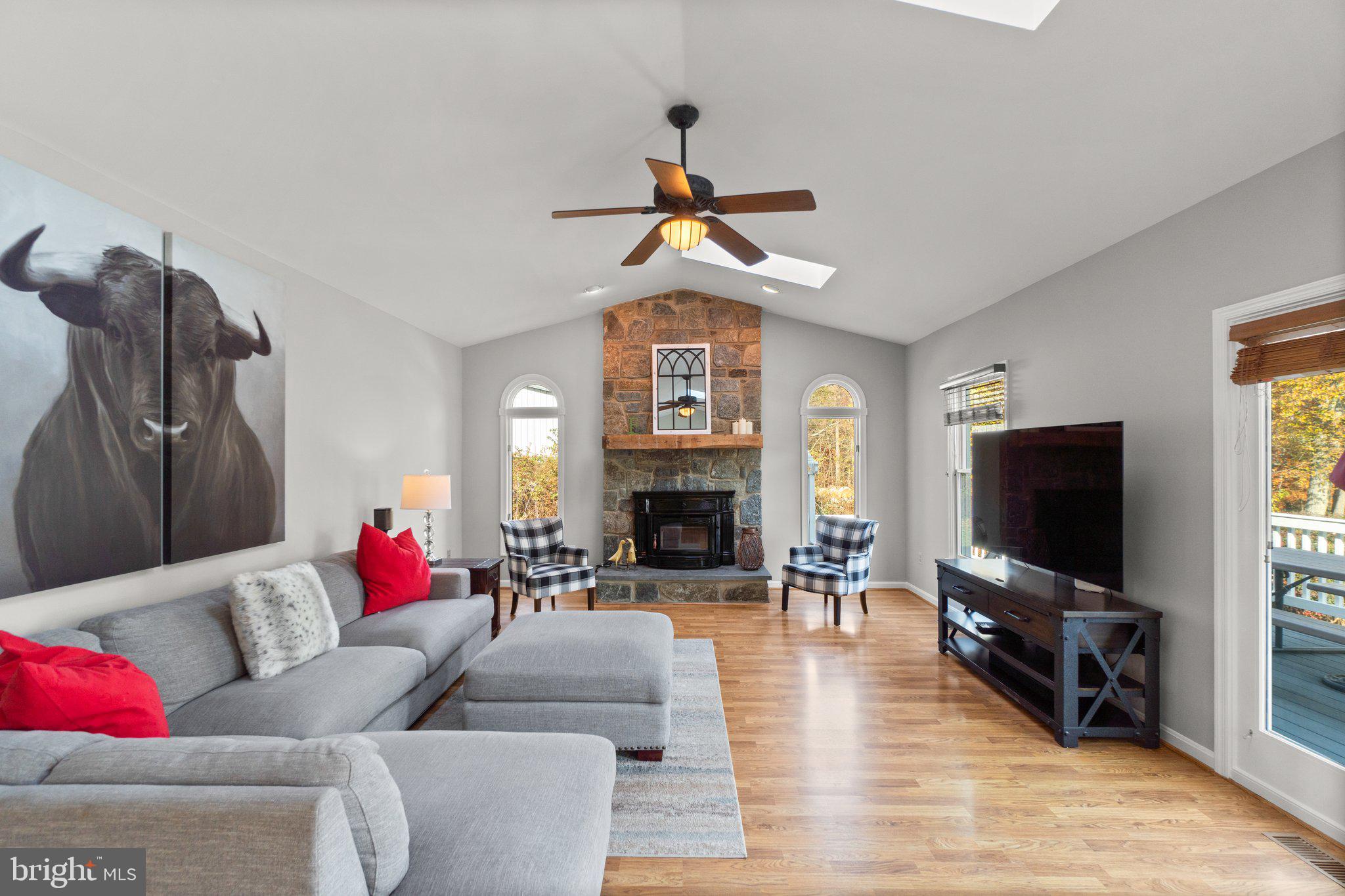 2713 Gillis Road Mount Airy, MD 21771 - Photo 9 of 47 Family Room w/ Stone Fireplace and Pitched Ceiling