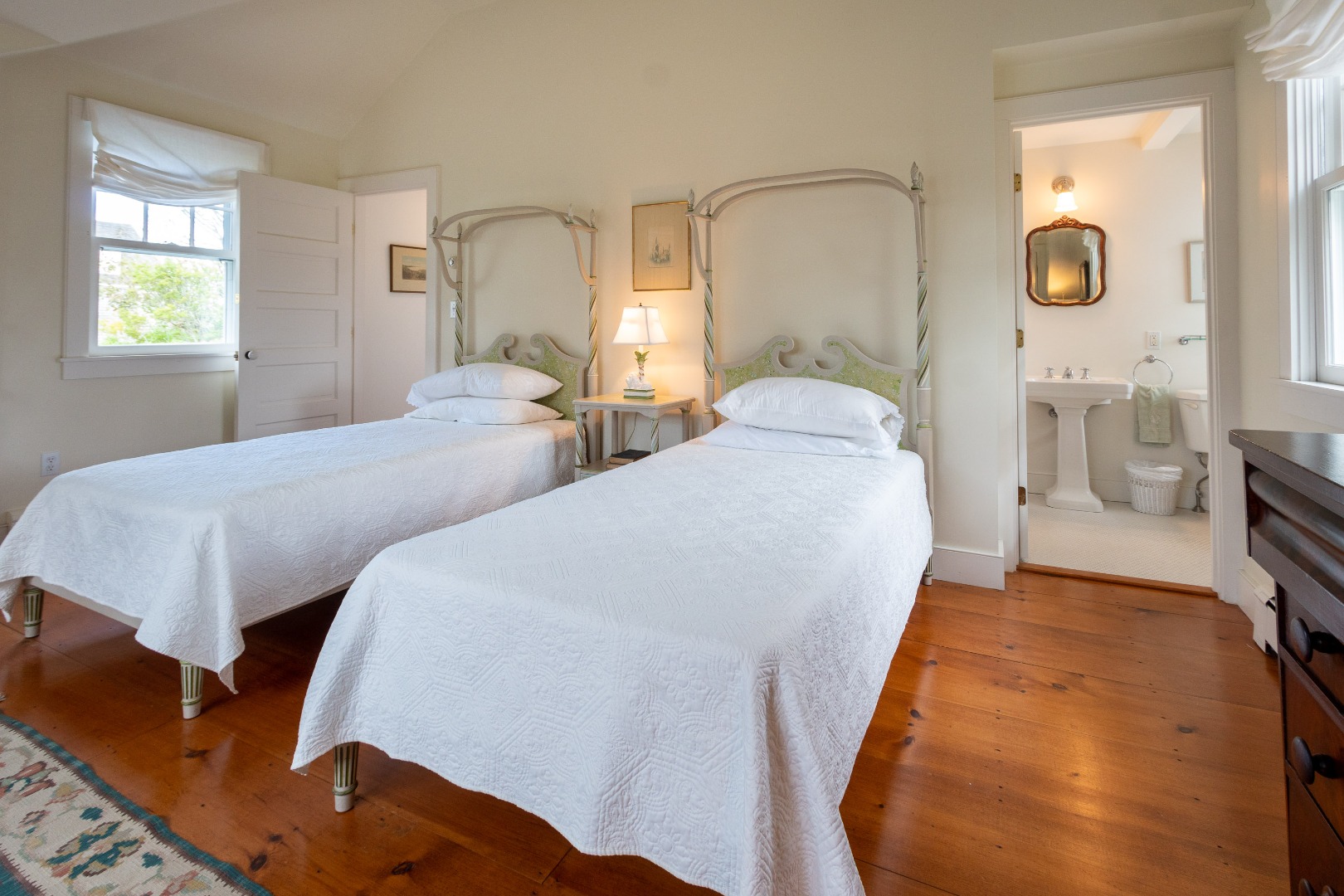 15 Cliff Road Nantucket, MA 02554 - Photo 43 of 50 a bedroom with two beds and painting on the wall