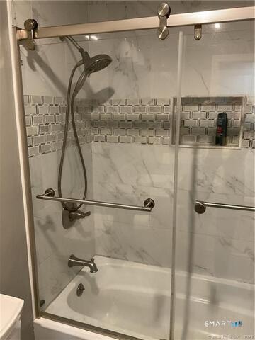 25 Padanaram Road, Unit 84 Danbury, CT 06811 - Photo 19 of 34 a bathroom with a shower and a sink
