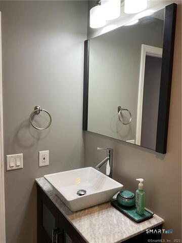 25 Padanaram Road, Unit 84 Danbury, CT 06811 - Photo 22 of 34 a view of a bathroom sink