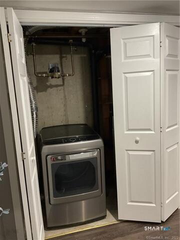 25 Padanaram Road, Unit 84 Danbury, CT 06811 - Photo 32 of 34 a close up view of a washer and dryer
