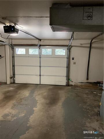 25 Padanaram Road, Unit 84 Danbury, CT 06811 - Photo 33 of 34 a view of a garage