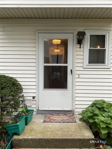 25 Padanaram Road, Unit 84 Danbury, CT 06811 - Photo 5 of 34 a view of a door of the house