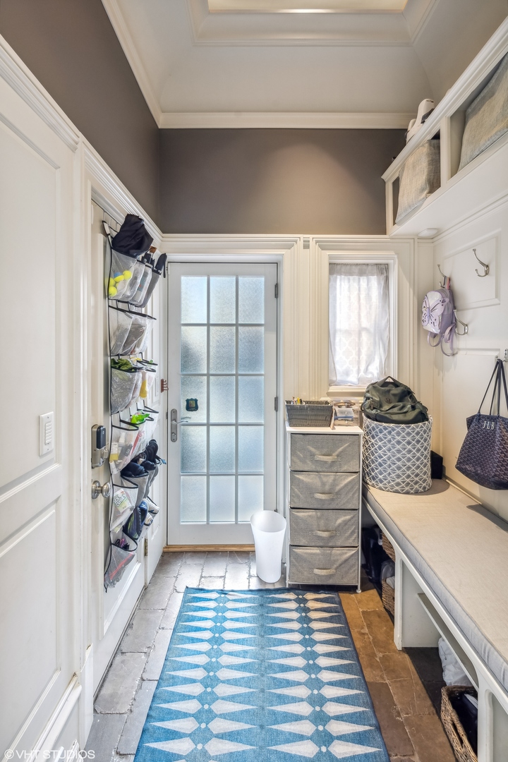 2015 North Racine Avenue Chicago, IL 60614 - Photo 10 of 44 a view of walk in closet with clothes and shoes