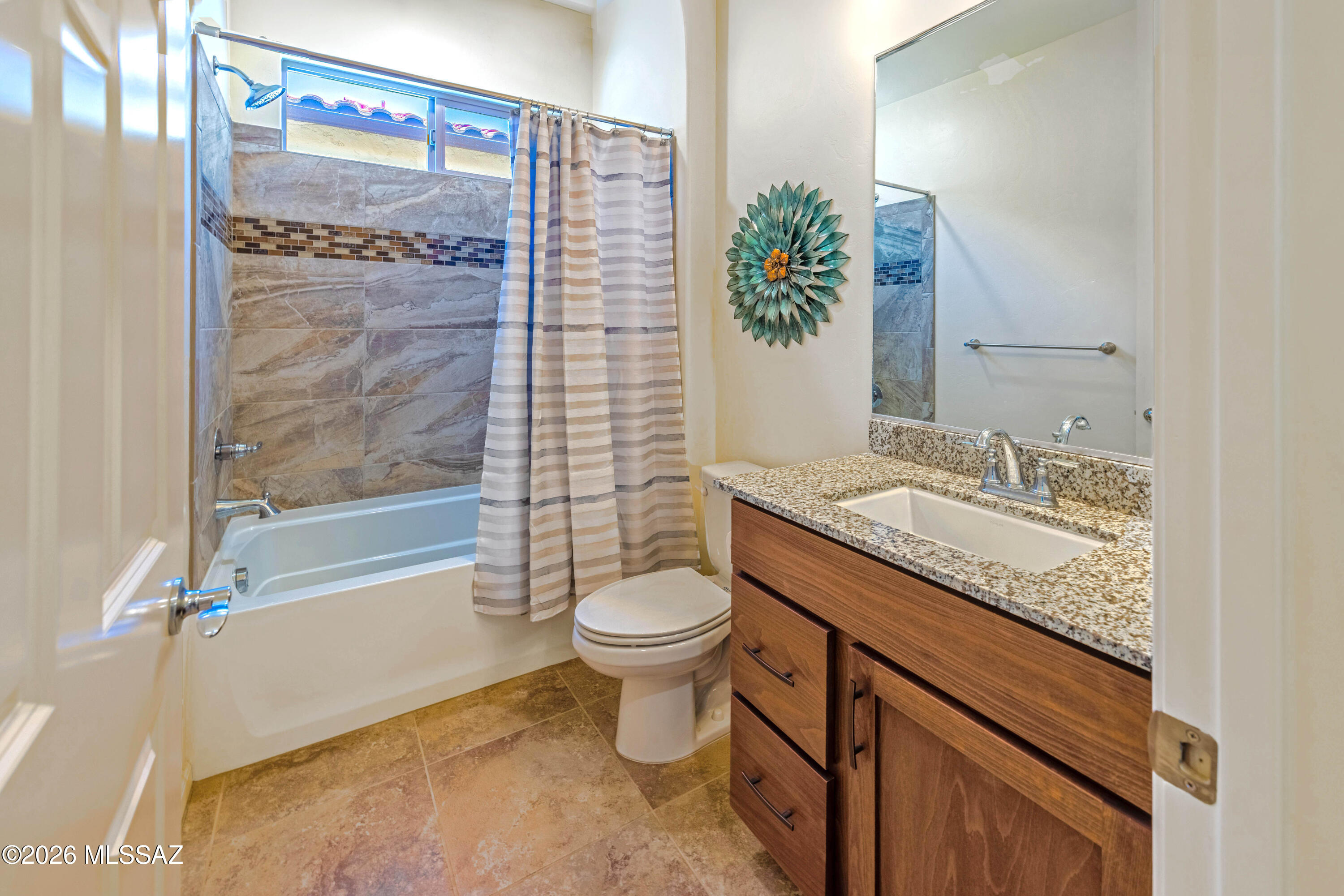 61193 East Shale Road Oracle, AZ 85623 - Photo 26 of 50 a bathroom with a granite countertop sink toilet and shower