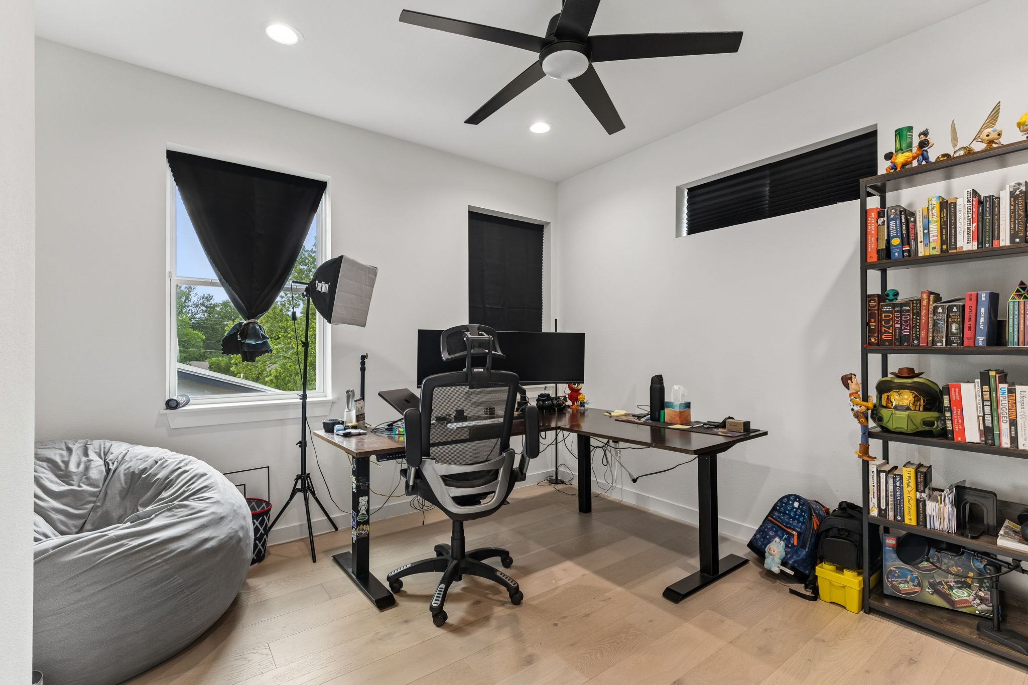 5305 Ledesma Road, Unit 1 Austin, TX 78721 - Photo 18 of 26 Light-filled interior space featuring wood-finish flooring, recessed lighting, and a ceiling fan
