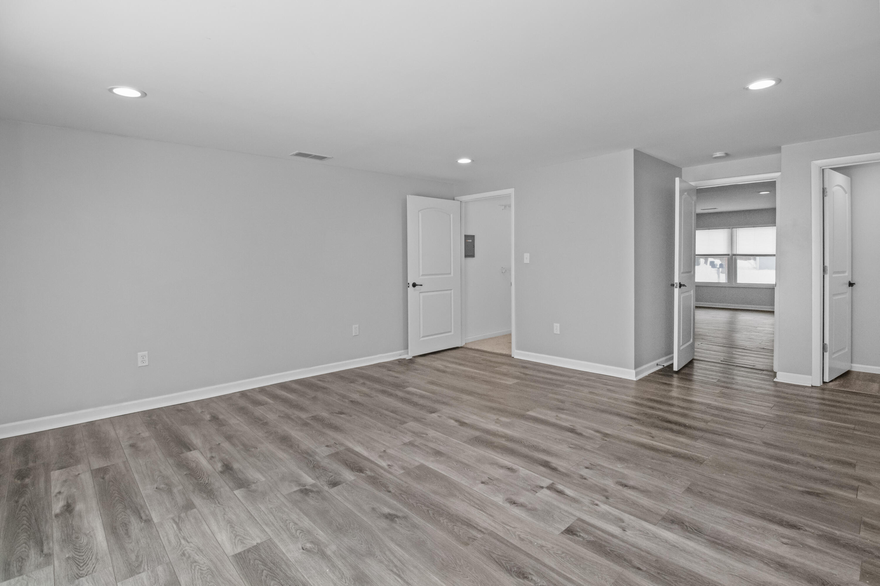 309 Michigami Trail Porter, IN 46304 - Photo 13 of 21 a view of an empty room with wooden floor and closet