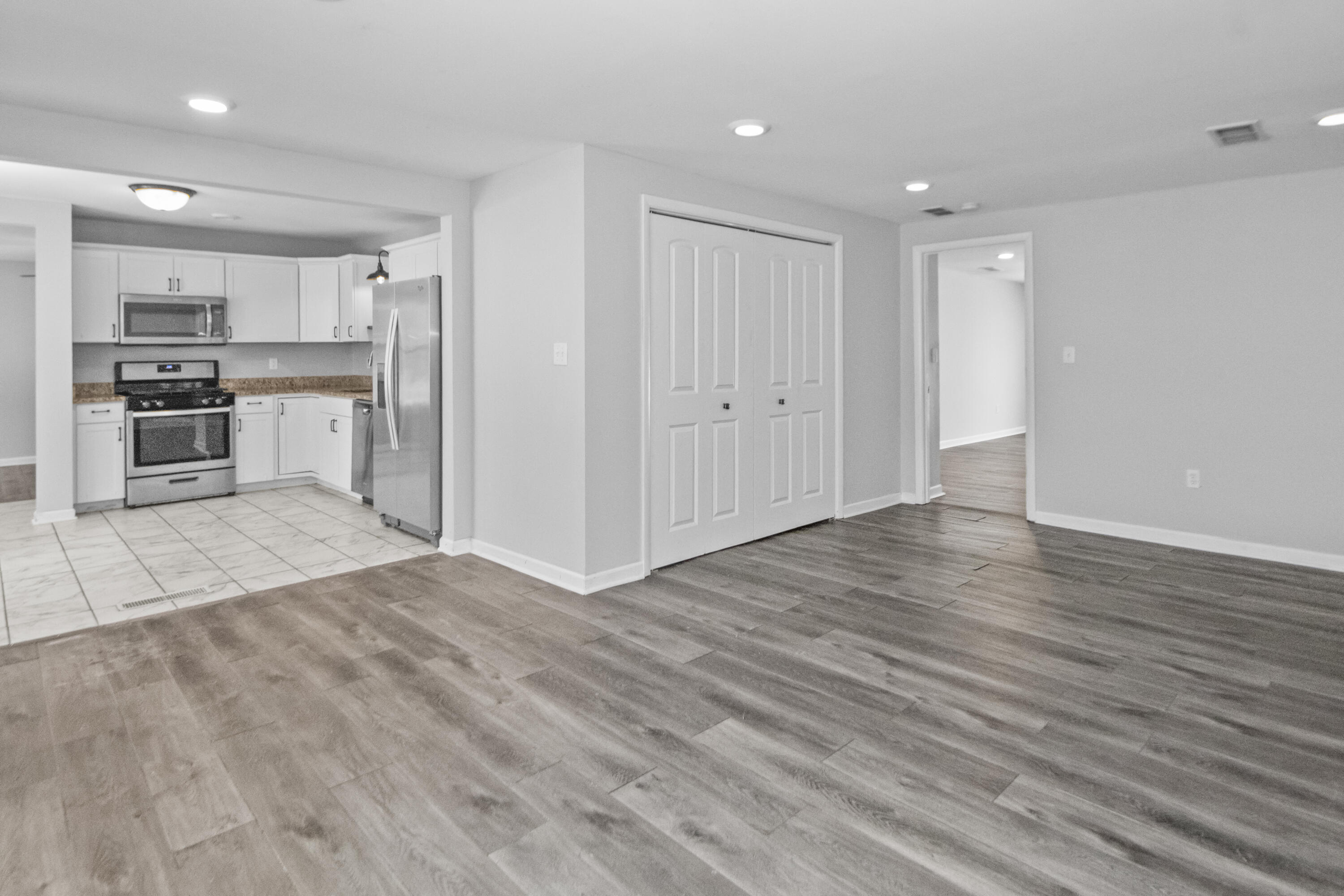 309 Michigami Trail Porter, IN 46304 - Photo 7 of 21 a view of kitchen with wooden floor and electronic appliances