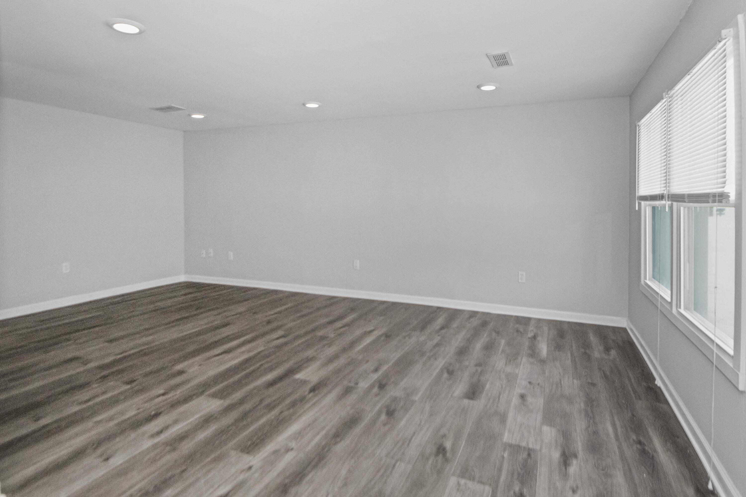 309 Michigami Trail Porter, IN 46304 - Photo 8 of 21 wooden floor in an empty room with a window