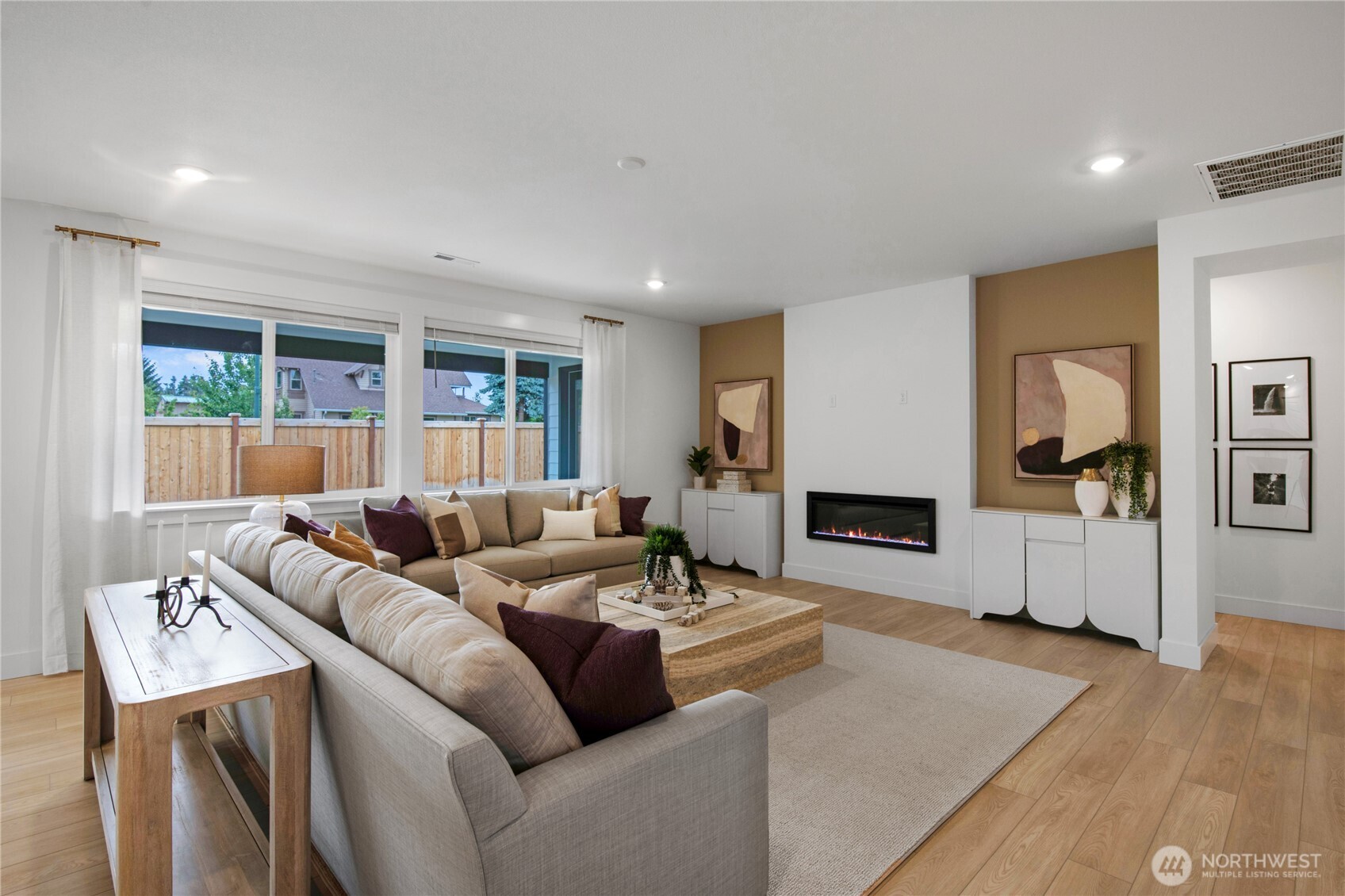 653 Gooseberry Place Sequim, WA 98382 - Photo 6 of 13 a living room with furniture and a wooden floor