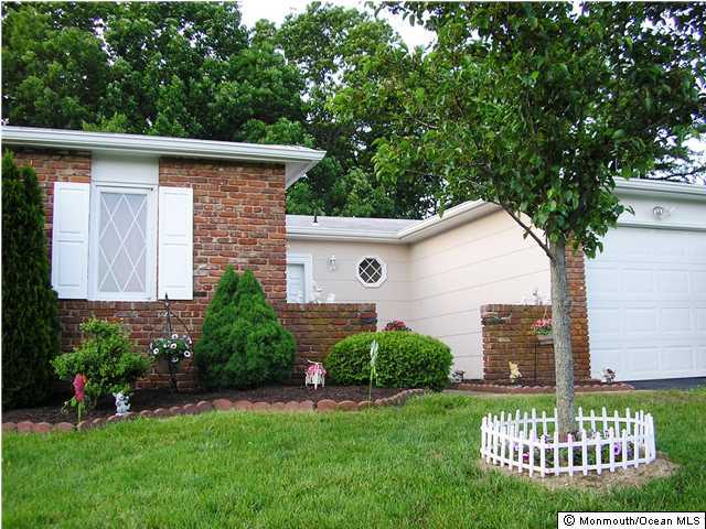 16 Phillips Road Brick, NJ 08724 - Photo 1 of 3 a view of a house with a yard