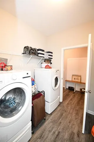 a white table sitting in a living room next to a window