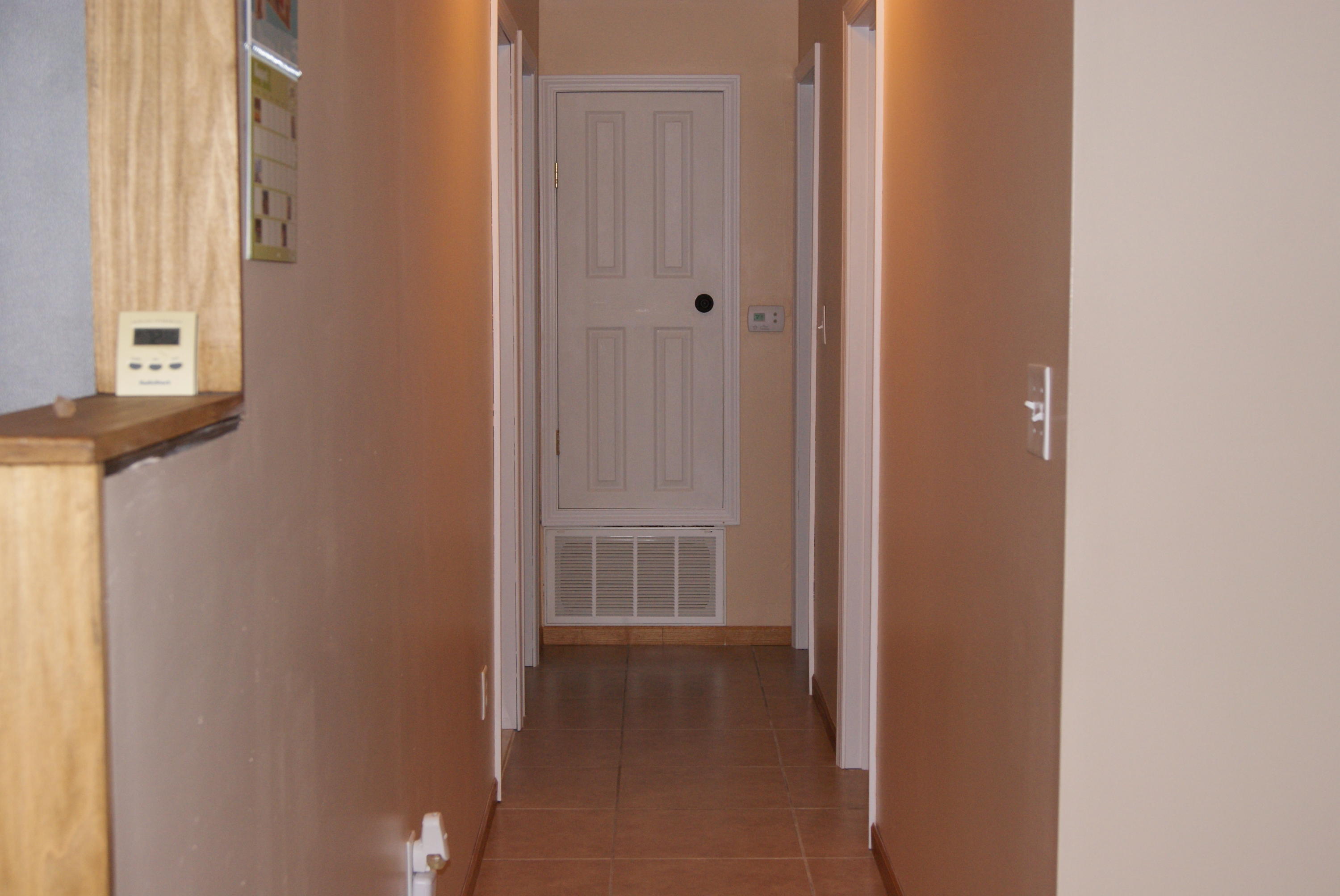 1137 Country Living Road Baker, FL 32531 - Photo 14 of 29 a view of hallway with closet and a window