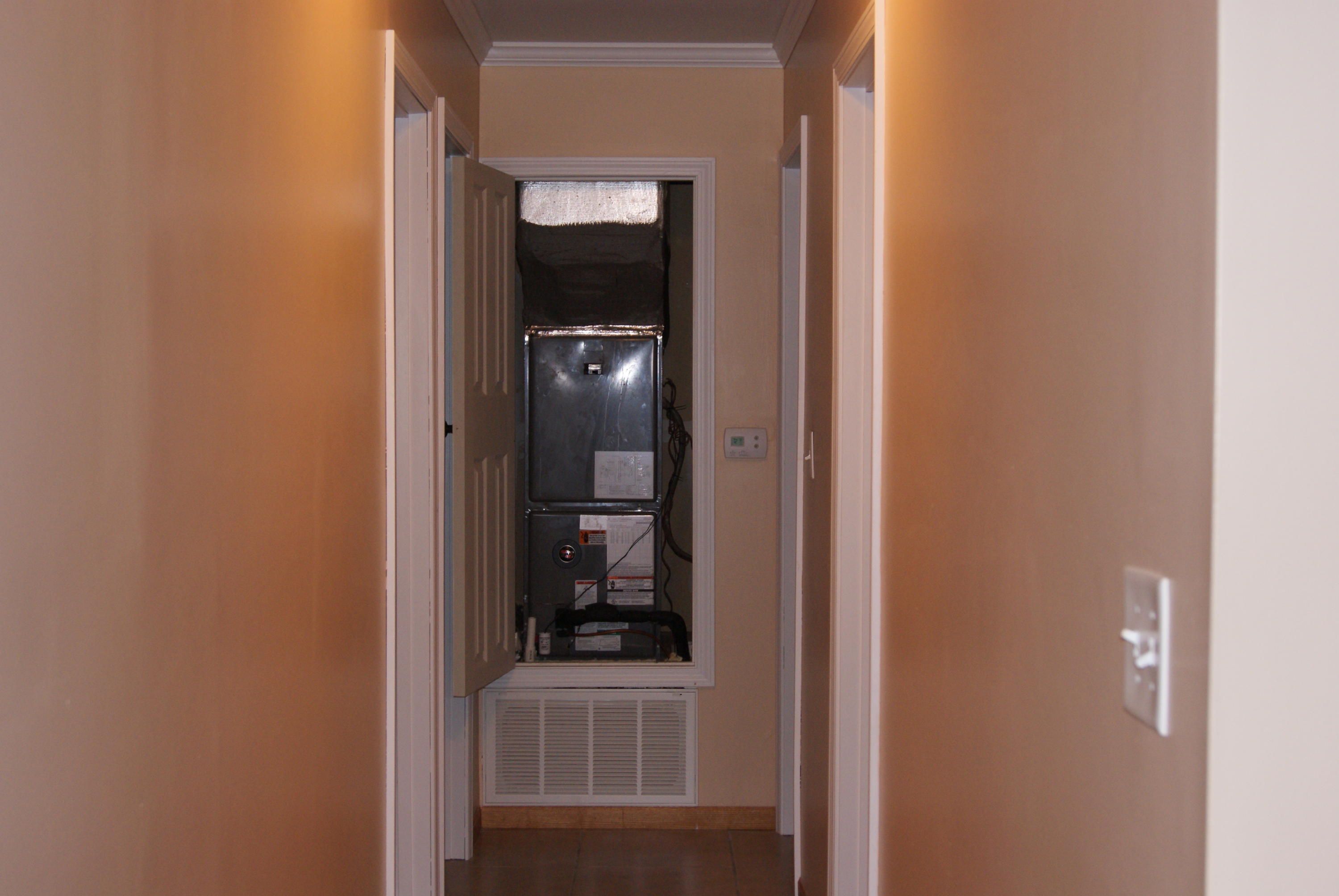1137 Country Living Road Baker, FL 32531 - Photo 15 of 29 a view of a bathroom from a hallway