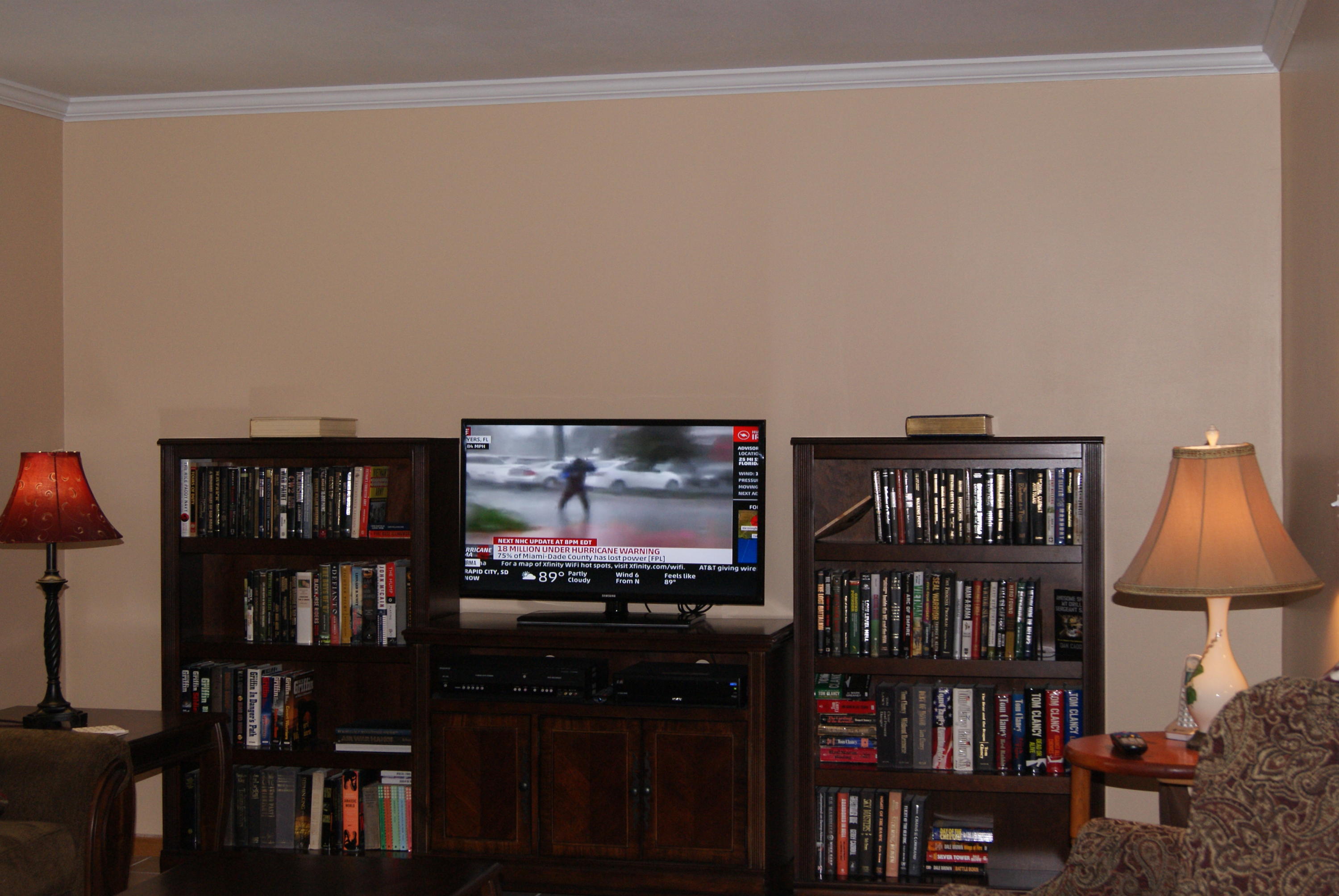 1137 Country Living Road Baker, FL 32531 - Photo 4 of 29 a living room with furniture and a flat screen tv