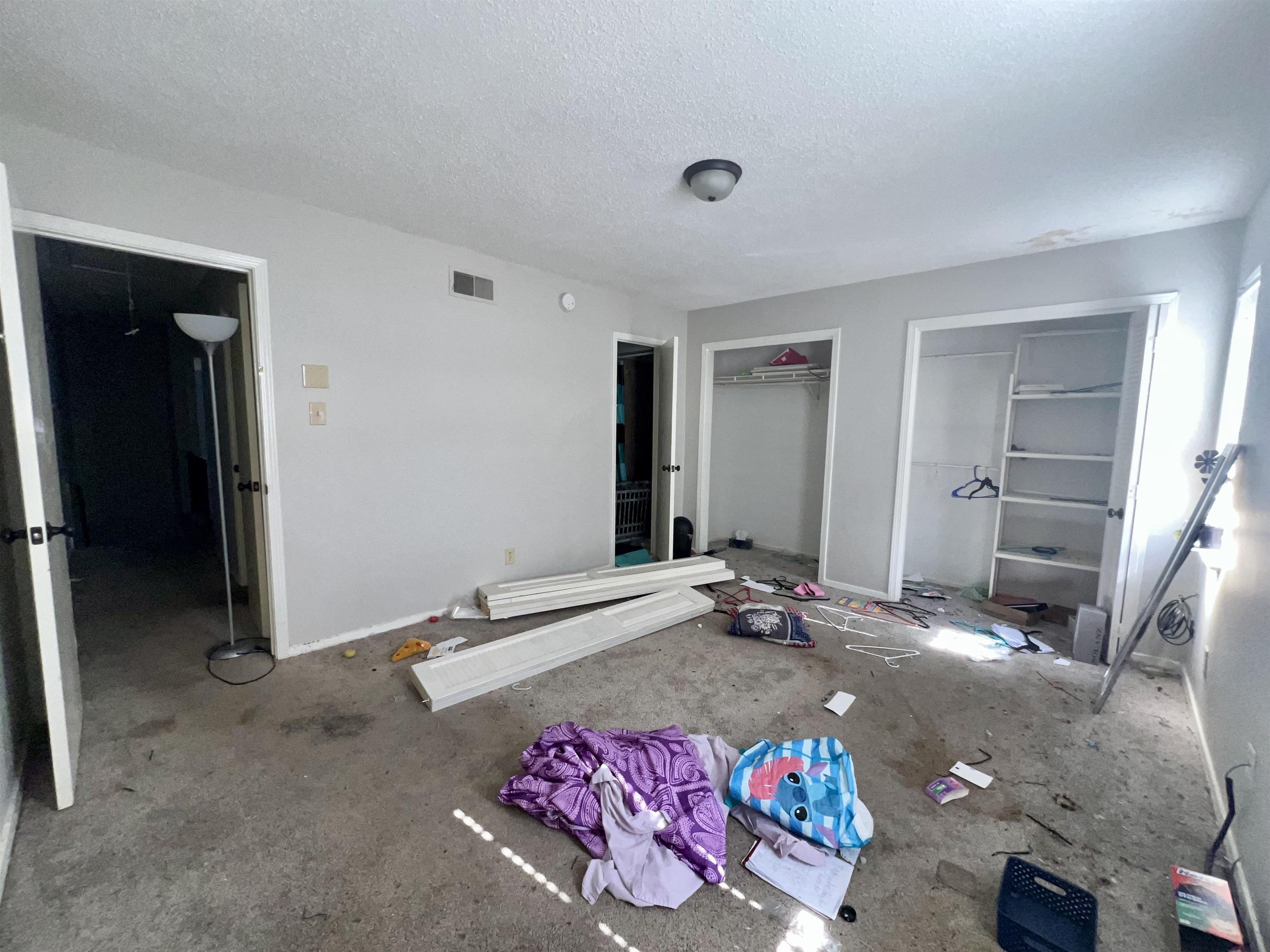 5573 Pleasant View Road, Unit 35 Memphis, TN 38134 - Photo 15 of 18 a living room with a couch and a dresser